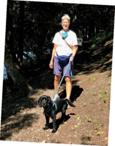 Bonstans and their newest pup, Paris, enjoy a walk