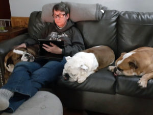 Veterinarian Sandi Sawchuk with her dogs