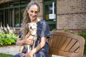Sandra Newbury DVM’03, director of UW–Madison’s Shelter Medicine Program, is pictured with her 14-year-old rescue pup, Peanut