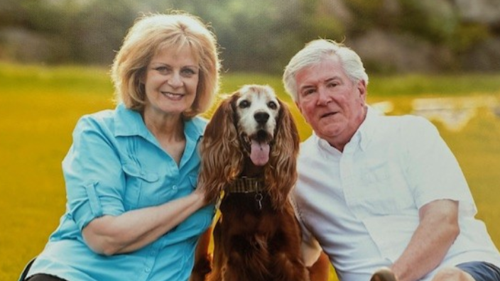 Gabrielle Banick and Gary Schwager with their Irish Setter, Ryley